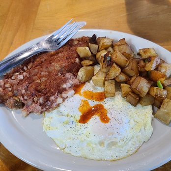 Good Day Cafe - 2 eggs  with corned beef hash and country potatoes.   Yumm - Breakfast & Brunch Near Me - Arlington, Texas