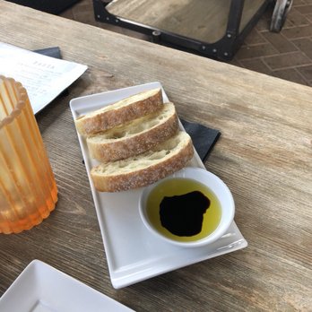 MIA Kitchen & Bar - Toasted Artisan Bread with Olive Oil - New American Near Me - Delray Beach, Florida