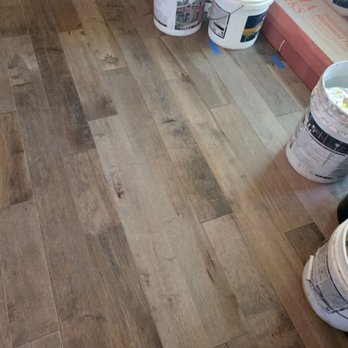 World Flooring - No attention to detail! New floor/old floor look like 2 different floors. Didn't even try to weave in light/dark pieces to look normal. - Flooring Near Me - El Cajon , California