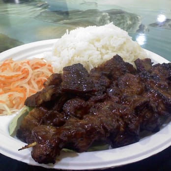 Wholly Grill - Combo platter of pork bbq and liempo (pork belly), with rice and achara. - Filipino Near Me - Mesa, Arizona Wholly Grill - Combo platter of pork bbq and liempo (pork belly), with rice and achara. - Filipino Near Me - Mesa, Arizona