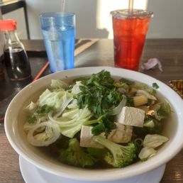 Veggie pho and pomegranate iced tea