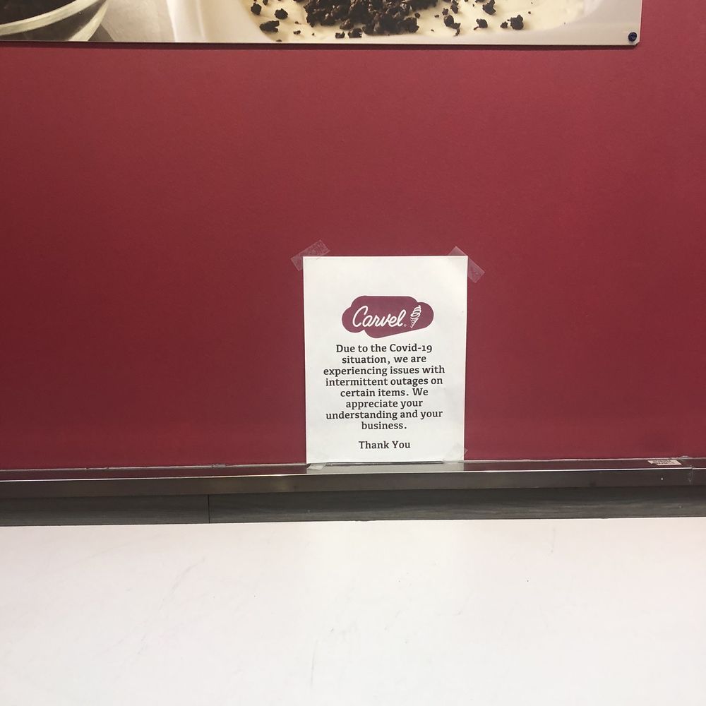 Carvel - a picture of a dessert in a display case - Ice Cream & Frozen Yogurt Near Me - Hicksville, New York