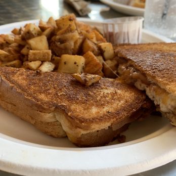 At The Corner - Adult grilled cheese--cheddar, ricotta, cheese curds, and a mixed berry jam. Different from any I've ever had but it was tasty. - Salad Near Me - Little Rock, Arkansas