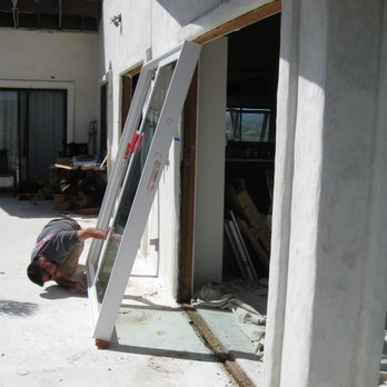 North County Window & Door - Working on one of the upstairs sliding doors - Windows Installation Near Me - Fallbrook, California North County Window & Door - Working on one of the upstairs sliding doors - Windows Installation Near Me - Fallbrook, California