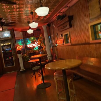 Martio's Pizza - a wooden bench and tables - Pizza Near Me - Nanuet, New York
