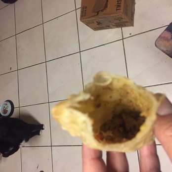 Dee’s Caribbean Cafe - Empanadillas de carne vacia, despues de una mordida - Puerto Rican Near Me - Texas City, Texas Dee’s Caribbean Cafe - Empanadillas de carne vacia, despues de una mordida - Puerto Rican Near Me - Texas City, Texas