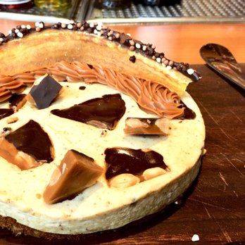 Cindy's Rooftop - Banana toffee cheesecake --almond toffee, plantain chips, dark chocolate - New American Near Me - Chicago, Illinois Cindy's Rooftop - Banana toffee cheesecake --almond toffee, plantain chips, dark chocolate - New American Near Me - Chicago, Illinois