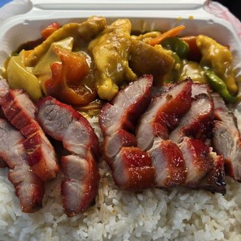 Uncle Henry - 2 item combination special with white rice, BBQ pork, and curry chicken - Asian Fusion Near Me - Denver, Colorado