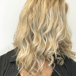 Styles by Chris - Hair color and hair extensions in multiple dimensions of blonde help give this hair more depth and movement on this fine thin hair.