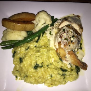 Tholos Restaurant - Rosemary stuffed chicken with risotto - Greek Near Me - Collingwood, Ontario Tholos Restaurant - Rosemary stuffed chicken with risotto - Greek Near Me - Collingwood, Ontario