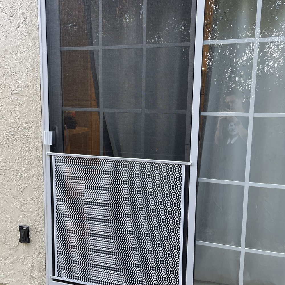 Sliding glass door screen.
