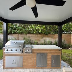 Perello Patio Outdoor Kitchens & Pergolas - Custom outdoor kitchen built and installed by Perello Patio (licensed contractor CGC1525000). Weather Pro cabinets, Bull and Blaze appliance
