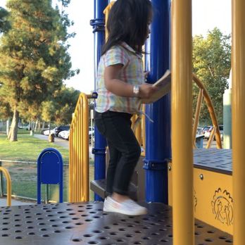Graceful Expression - My daughter playing at the park holding a book :) - Speech Therapists Near Me - Pasadena, California