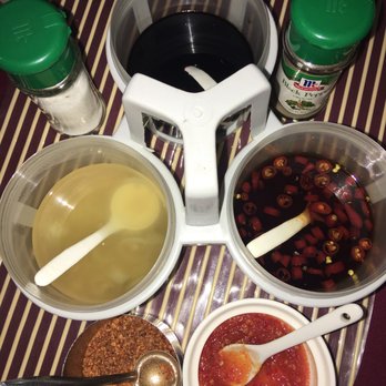 Siam House - Condiments - my fav was the sweet and spicy sauce in the lower right. - Thai Near Me - Angeles, PAM