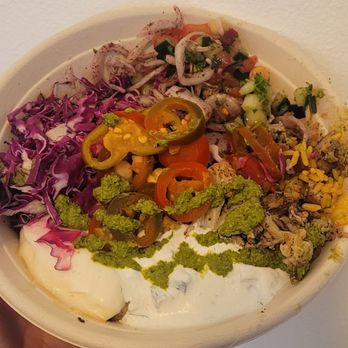 SAJJ Mediterranean - I forgot to take a picture before I already started eating! Build your own - fullll of toppings! - Mediterranean Near Me - San Ramon, California