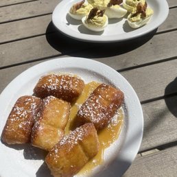 Beignets and the devil eggs with candied bacon