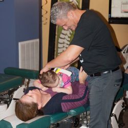 Lieberman Family Chiropractic - Dr. B adjusting an infant.