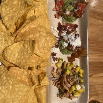AVO TACO - Guacamole flight with mango salsa /chipotle, chicken, mango salsa/caramelized, pineapple, bacon, and cotija cheese - Tacos Near Me - Bayside, New York