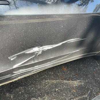 Carsmetics - damage to front passenger door - Body Shops Near Me - Tampa, Florida