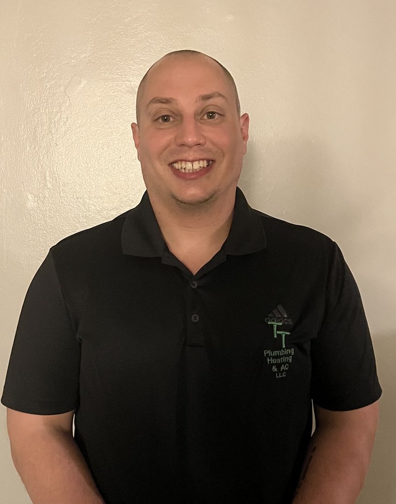 Slide of TT Plumbing Heating and AC