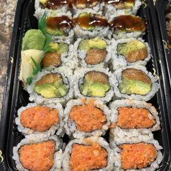 Mizu Sushi & Asian Fusion - Top to bottom: eel avocado roll, Alaska roll, spicy crunchy tuna roll