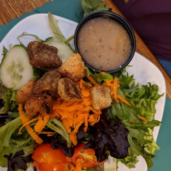 Brady's - a plate of salad with dressing - American Near Me - Peterborough, New Hampshire