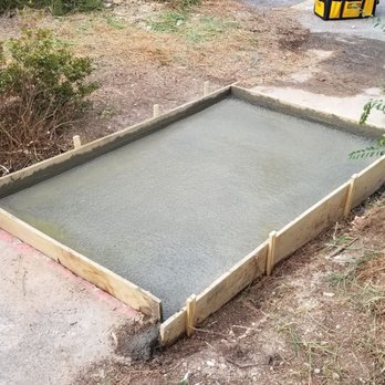 Hunter Excavating - a concrete slab being poured - Landscaping Near Me Hunter Excavating - a concrete slab being poured - Landscaping Near Me
