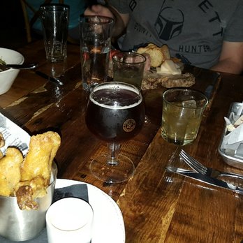 Pub Thirty Two - Meat and cheese platter (served on a tree slice), Portobello fries, and a fireside chat red ale from 21st amendment. - Gastropubs Near Me - Mission Viejo, California