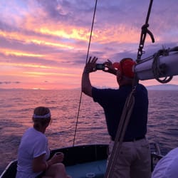 Kohala Sail & Sea - Passenger Pat of Salinas snaps a pic of the colorful sunset aboard Riva.