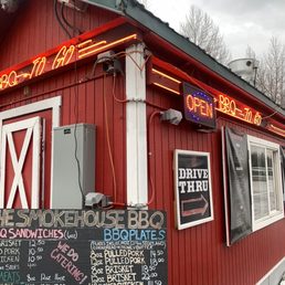 a red building with neon signs