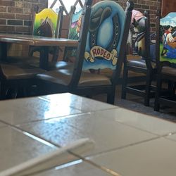Rodeo Mexican Restaurant - Some funny art on the chairs