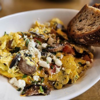Sunny Side Solana - an omelet with mushrooms and feta cheese - Breakfast & Brunch Near Me - Solana Beach, California Sunny Side Solana - an omelet with mushrooms and feta cheese - Breakfast & Brunch Near Me - Solana Beach, California