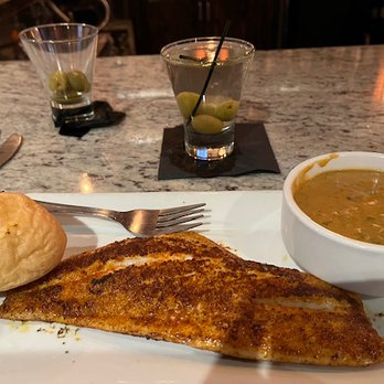 Fezzo's of Broussard - Blackened Redfish before adding crawfish & tasso sauce. Dirty Martini. - Seafood Near Me - Broussard, Louisiana Fezzo's of Broussard - Blackened Redfish before adding crawfish & tasso sauce. Dirty Martini. - Seafood Near Me - Broussard, Louisiana