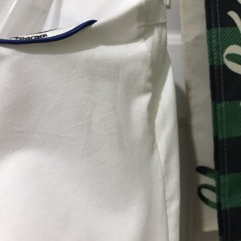 Tulip Dry Cleaning - Wrinkles pressed into the shirt where sleeve joins body of shirt. - Sewing & Alterations Near Me - Keller, Texas Tulip Dry Cleaning - Wrinkles pressed into the shirt where sleeve joins body of shirt. - Sewing & Alterations Near Me - Keller, Texas