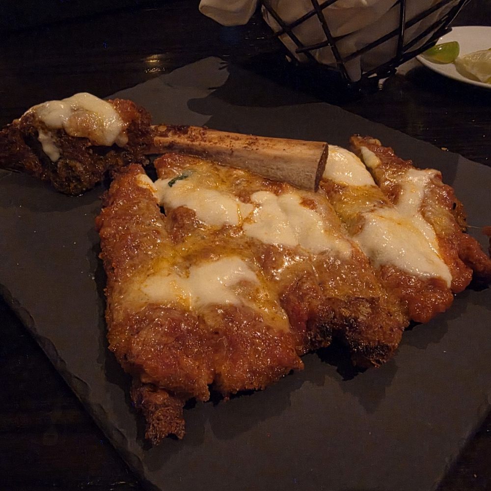 Scarpetta - Veal chop parm - Italian Near Me - Las Vegas, Nevada Scarpetta - Veal chop parm - Italian Near Me - Las Vegas, Nevada