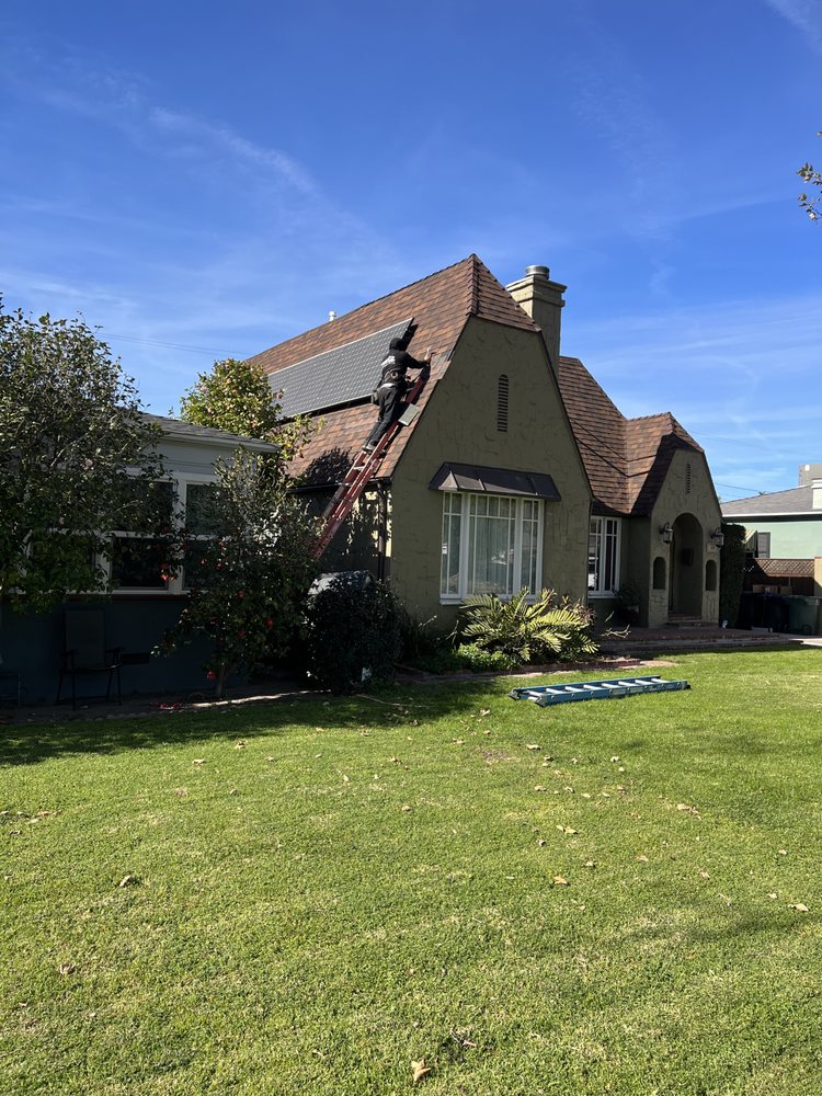 Slide of Ortiz Roofing