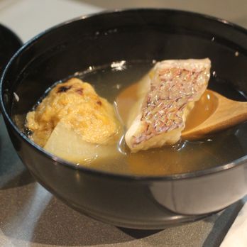 Nanzan GiroGiro - Tai snapper with the broth, monk fish liver miso, daikon radish, and lime. - Japanese Near Me - Honolulu, Hawaii