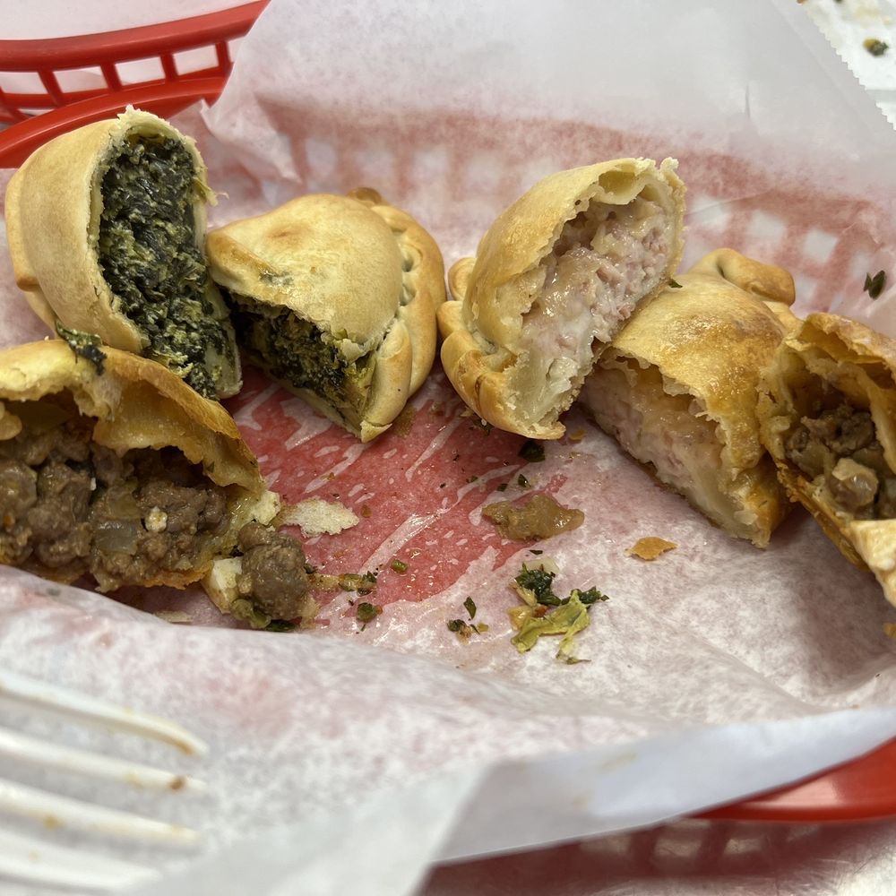 El Gaucho Meat Market - Empanadas - sliced in half to show filling. Spinach, chicken and beef. - Meat Shops Near Me - Anaheim, California El Gaucho Meat Market - Empanadas - sliced in half to show filling. Spinach, chicken and beef. - Meat Shops Near Me - Anaheim, California