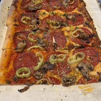 The Twisted Olive - Build your own pie, with pepperoni, mushroom and banana peppers, half with cheese and the other without. - Italian Near Me - North Canton, Ohio