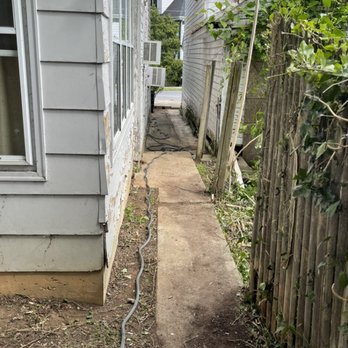 A Clean Solution - Alleyway (Before) - Landscaping Near Me