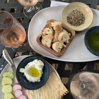 Pearl Wine Cottage - Dukkah (seed and nut mix with olive oil) and Goat Cheese. The goat cheese plate with olive oil paired with crudités and rosemary crackers. - Wine Bars Near Me - Ephraim, Wisconsin