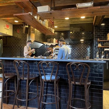 Gralehaus - two people working at a bar - Beer Bar Near Me - Louisville, Kentucky