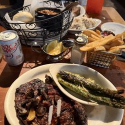 Cool Hand Luke's - Rib Luke's Western Ribeye cooked medium. D/Side Grilled Asparagus & steak fries