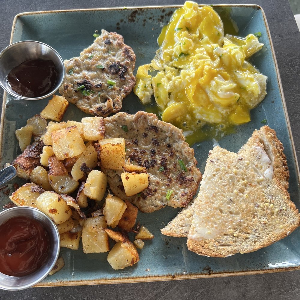 First Watch - Traditional breakfast with chicken sausage (a tad sweet) and eggs over easy (chopped up because my husband stared before I took the pic!) - Cafes Near Me - Tucson, Arizona First Watch - Traditional breakfast with chicken sausage (a tad sweet) and eggs over easy (chopped up because my husband stared before I took the pic!) - Cafes Near Me - Tucson, Arizona