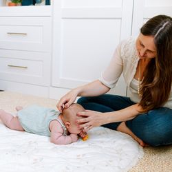 Navigating Parenthood - Shari doing CST with 4-month-old baby