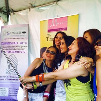 Tess Mauricio, MD - Dr. Tess taking a photo at an event in Northern California this past August. - Dermatologists Near Me - San Diego, California Tess Mauricio, MD - Dr. Tess taking a photo at an event in Northern California this past August. - Dermatologists Near Me - San Diego, California