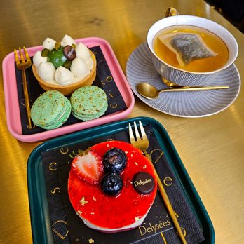 Delysees - a plate of desserts and a cup of tea - Desserts Near Me - Toronto, Ontario