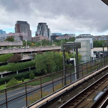 Washington Metropolitan Area Transit Authority - Looking in the other direction from DCA's Metro station platform are the high-rent businesses, bureaucracies, and condos in NoVa - Public Transportation Near Me - Washington, DC, District of Columbia