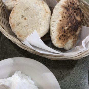 Oasis Mediterranean Cuisine - This bread is just fresh out of the oven delicious with the garlic dip! - Mediterranean Near Me - Warren, Michigan Oasis Mediterranean Cuisine - This bread is just fresh out of the oven delicious with the garlic dip! - Mediterranean Near Me - Warren, Michigan