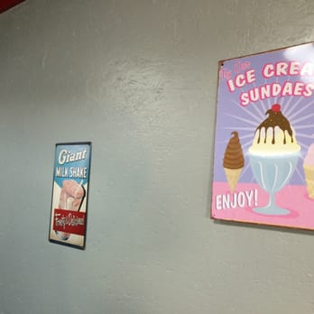 Daisy Mae's - an ice cream sundaes sign on a wall - Ice Cream & Frozen Yogurt Near Me - Stanton, Michigan